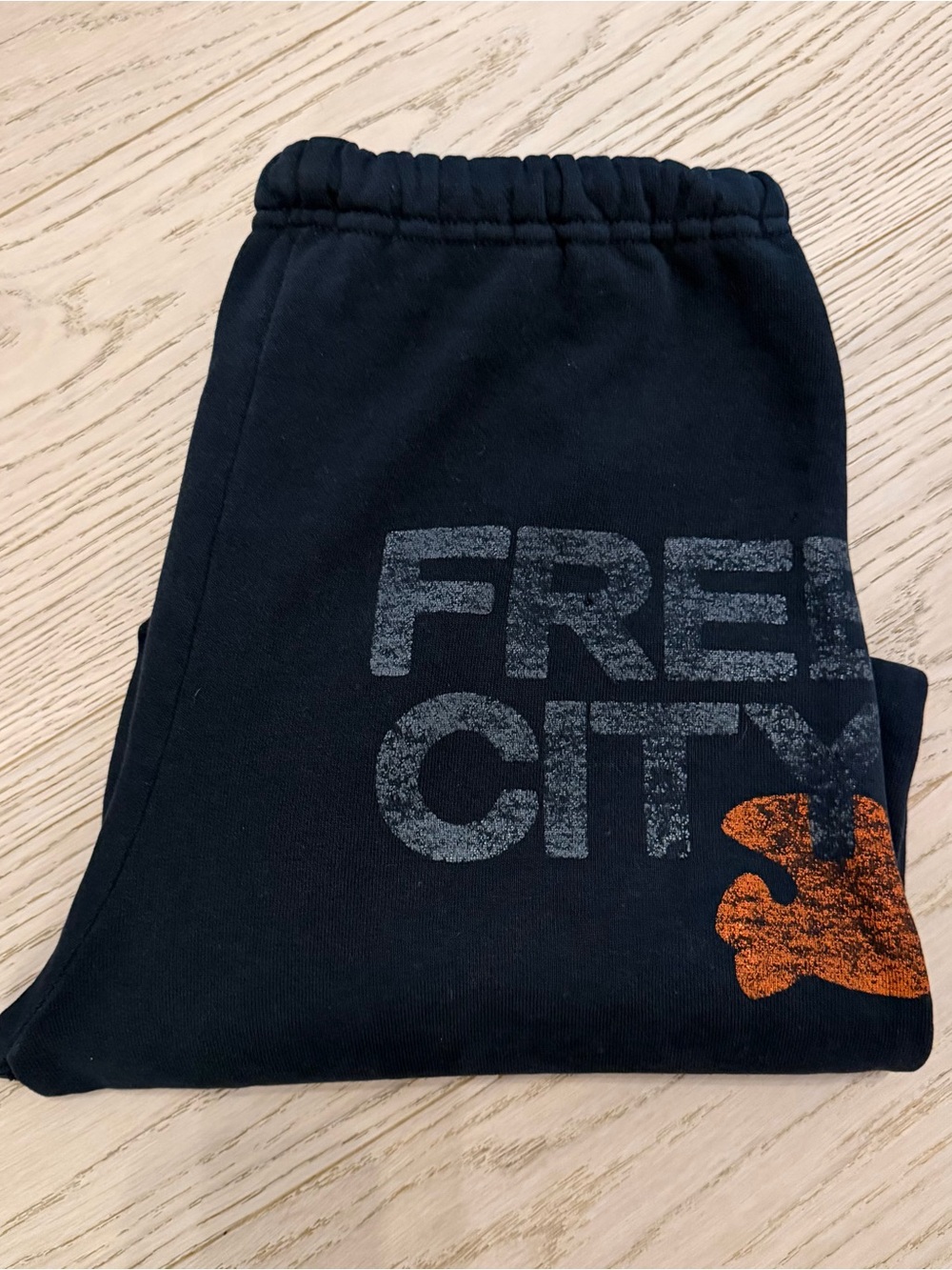 freecity Kids Navy Sweatpants with Gray Logo and Orange Accent